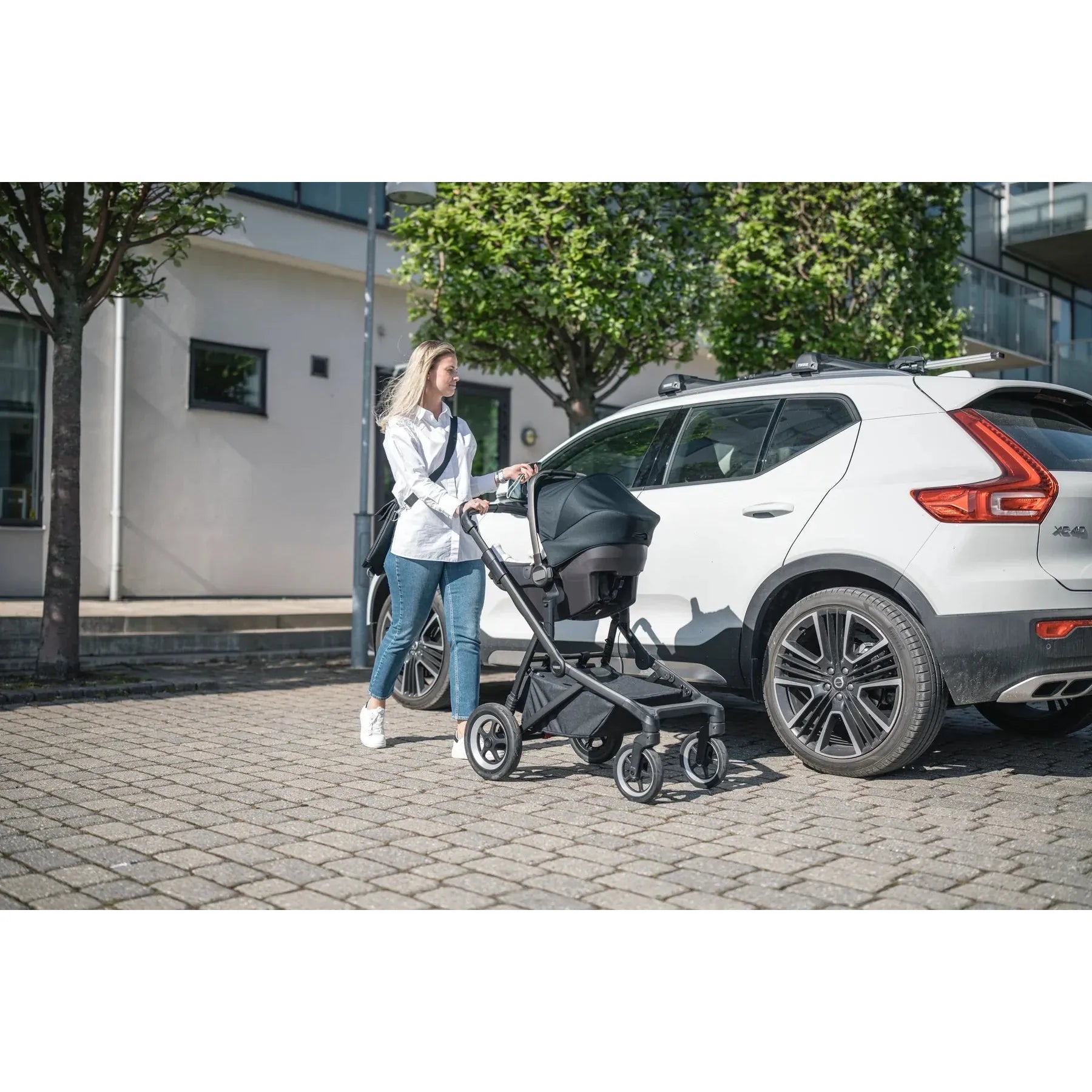 Thule Sleek: Convertible Single-to-Double Urban Stroller + Sibling Seat