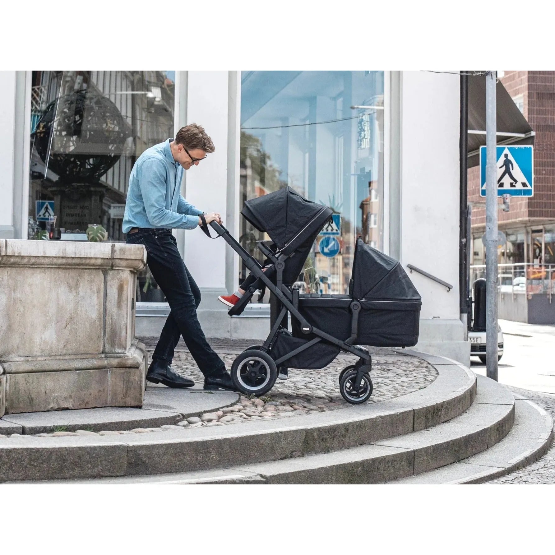Thule Sleek: Convertible Single-to-Double Urban Stroller + Sibling Seat