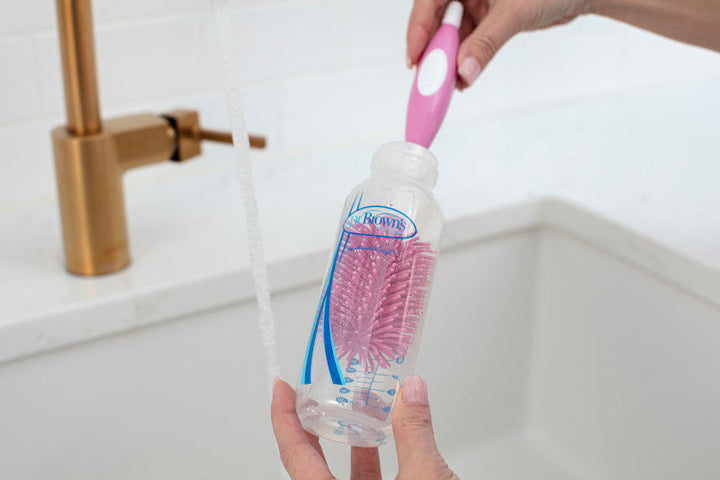 https://cdn.shopify.com/s/files/1/0659/5860/9120/files/Lifestyle_Soft-Touch_Bottle_Brush_Pink_cleaning_Narrow_bottle_1.jpg?v=1684921080
