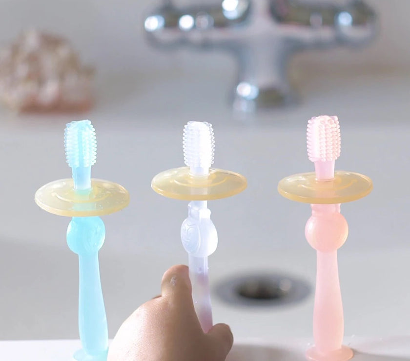 Haakaa 360° Silicone Toothbrush (Orange) | Little Baby.