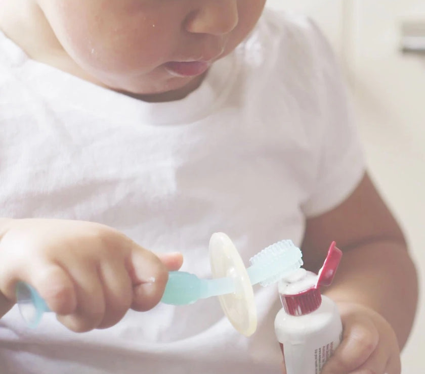Haakaa 360° Silicone Toothbrush (Orange) | Little Baby.