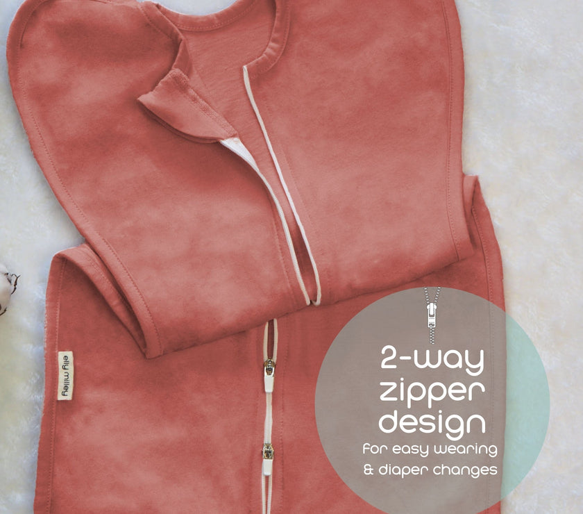Our organic Zip Swaddle is a 2 way zipper design for easy wearing and diaper change