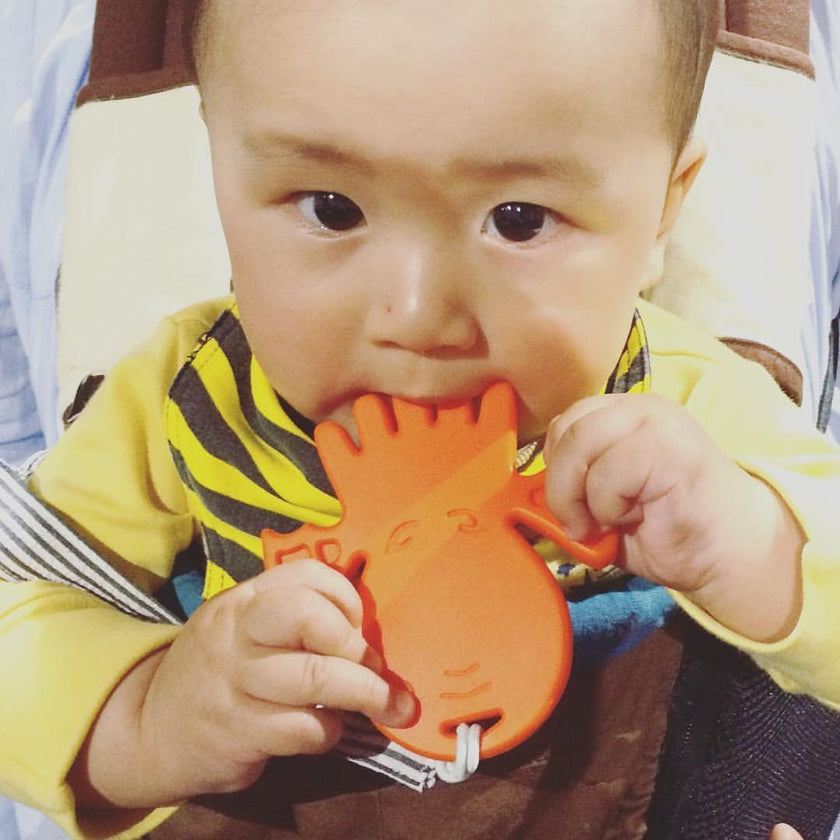 Helles Teeth Cthulhu Teether (Worm Orange) | Little Baby.